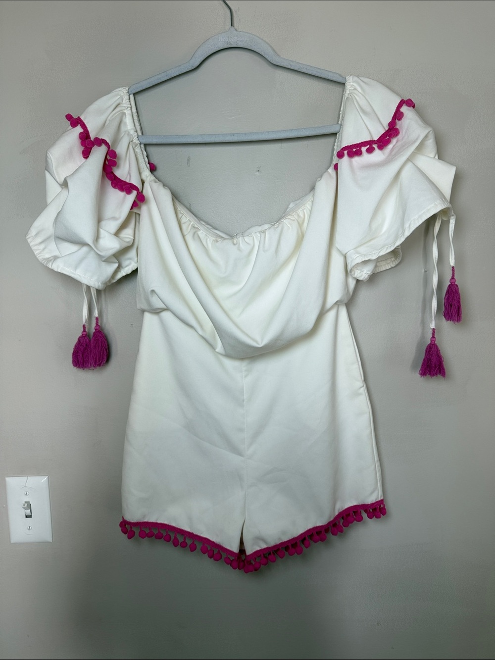 Tea & Cup White Off-Shoulder romper with Fuchsia Pom Trim. Size Small